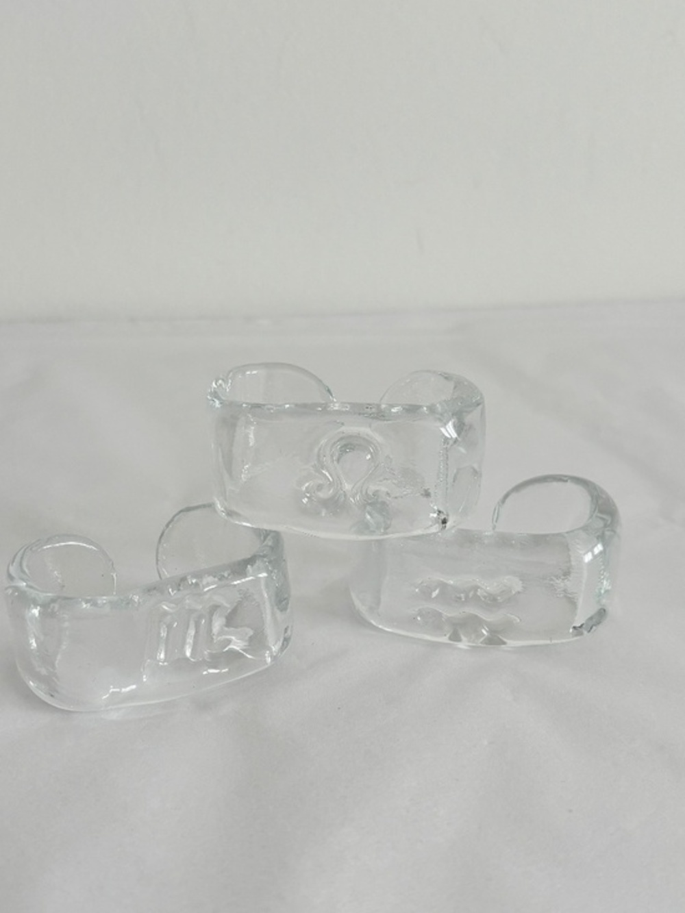Vintage glass napkin rings SET of THREE MCM style embedded design on each one